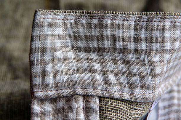 Finished button inside waistband